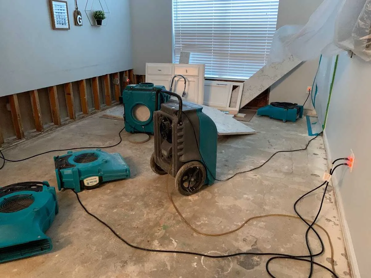 Dehumidifier in flood-cut room for Water Damage Restoration in Tupelo